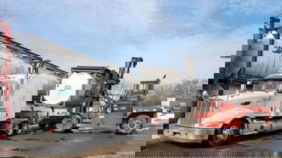 ISO container loaded on a Heniff trailer