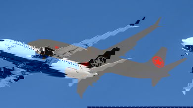 An Air Canada jet flying overhead