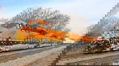 A photograph of a train hauling intermodal containers.