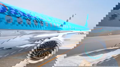 Light blue Korean Airlines jet, up close view