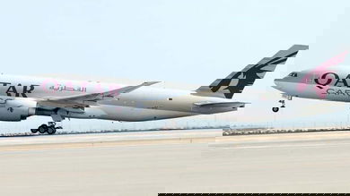 A big gray jet lifts off.