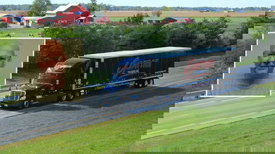 Garner Trucking tractor-trailer; inset photo of driver Eric Eaton.
