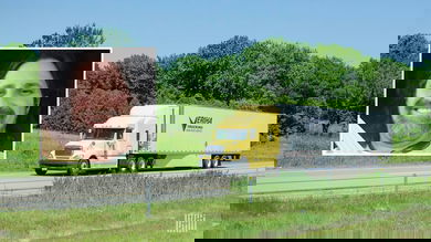 Photo of Veriha Trucking tractor-trailer with inset photo of driver Frank Martin.