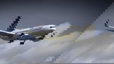 White jet on appoach for landing.