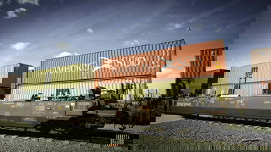 A photograph of four intermodal containers.
