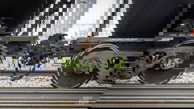 A photograph of two railcars coupled together.