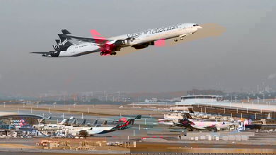A white and red Virgin Atlantic plane takes off from Brussels Airport. The airport saw positive cargo growth in June for the first time since February.