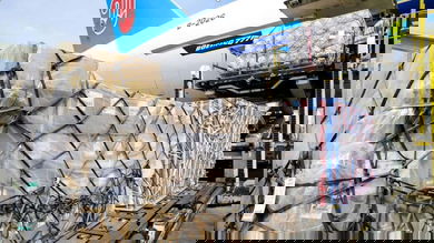 Cargo pallets come off a the rear door of a big cargo plane. China cargo capacity is shrinking and rates are going back up, according to the latest data.