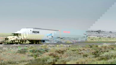 A tractor-trailer from Mullen Group's Payne Transportation drives on a road. Mullen Group reported second-quarter earnings on July 22.