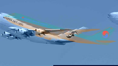 A pale blue Korean Air 747 cargo jet soars into a bright blue sky. Korean Air's cargo division helped the airline survive the coronavirus downturn.