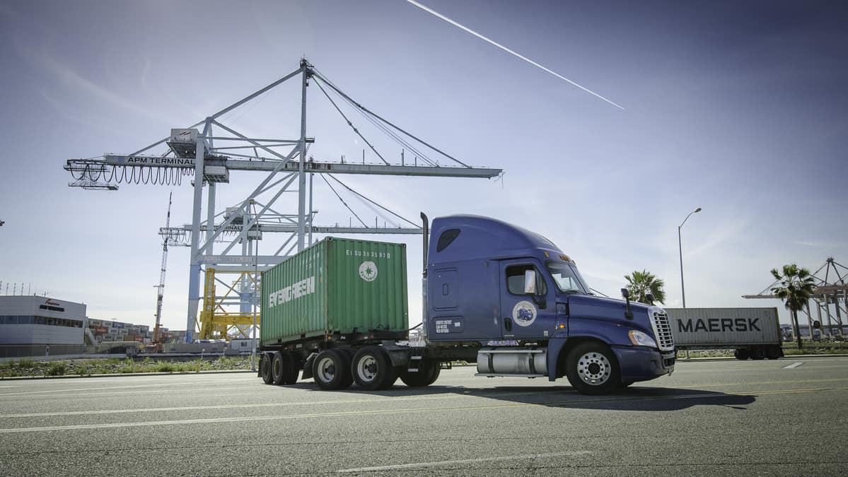 A tractor moves a container at a U.S. port.