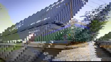 A photograph of intermodal containers on a train.