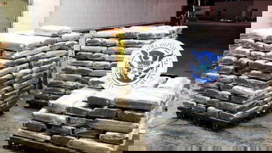 Palates of marijuana seized by CBP officers. A trucker was arrested at the US Canada border after marijuana was found in a shipment of pork