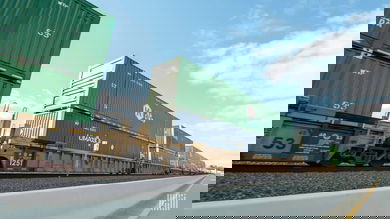 A photograph of intermodal containers on a train.