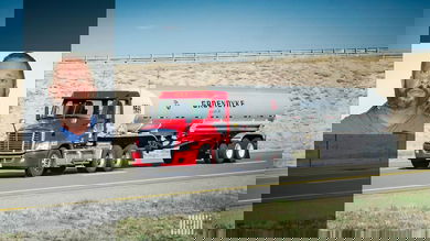 Groendyke Transport tanker on a desert highway. Inlay photo of driver Morgan Kirkland.