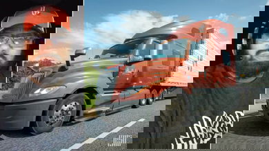 Composite photo of driver Demetrius Fields and a Hirschbach Motor Lines truck.