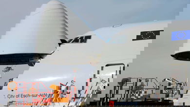 Nose cone of a 747 jumbo freighter is open so cargo can be loaded.