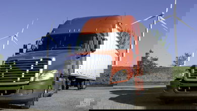 truck in front of windmills