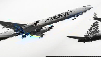 An Alaska Air 737 MAX landing, view from below.