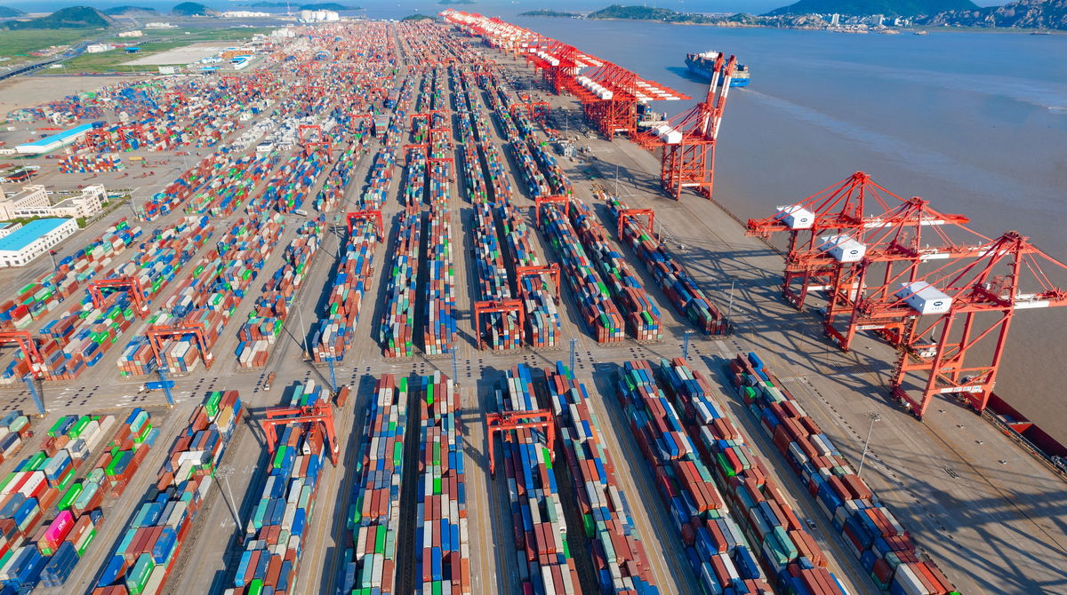 An aerial view showing shipping containers stacked up at the Port of Yangshan in Shanghai, China