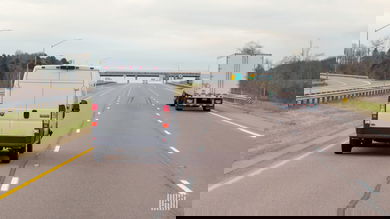 White delivery van on highway