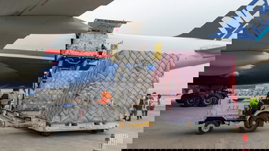 Cargo being loaded onto plane