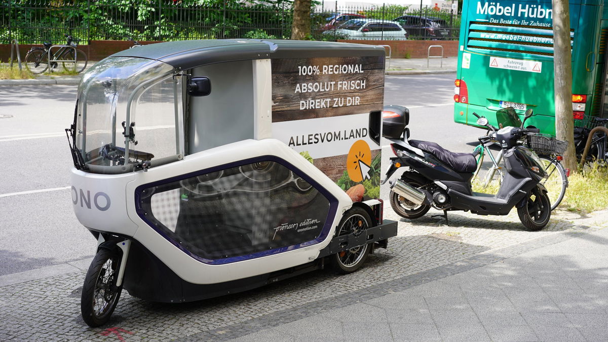 e-cargo bike parked on sidewalk