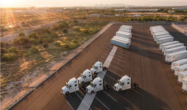 Aerial of TuSimple tractors and trailers