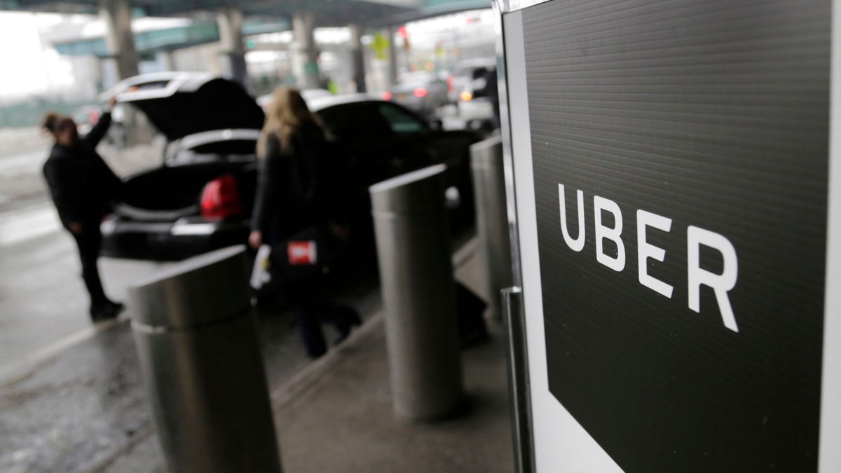 Uber sign at airport