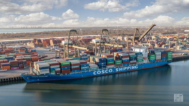 a photo of a Cosco container ship