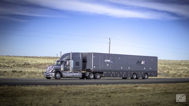 Truck hauling cargo for film production.