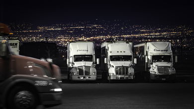 trucks at rest stop at night